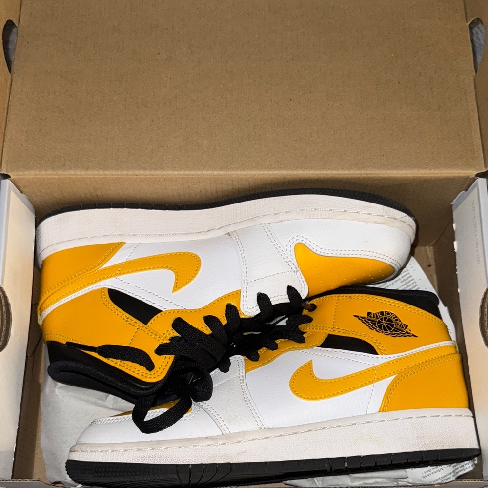 Air Jordan 1 Yellow and Black High-Top Sneakers